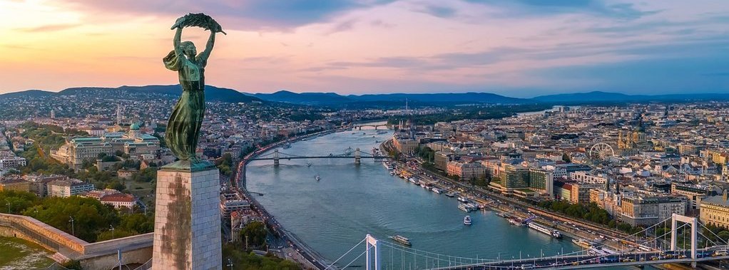 Budapest cityscapes form Gellert Hill. Amazing sunset in the background. Included the Danube river, historical bridges, Budapest dwontown, Gellrt square, Gellert hotel, Gellert thermal bath,Gellert Square and Liberty bridge